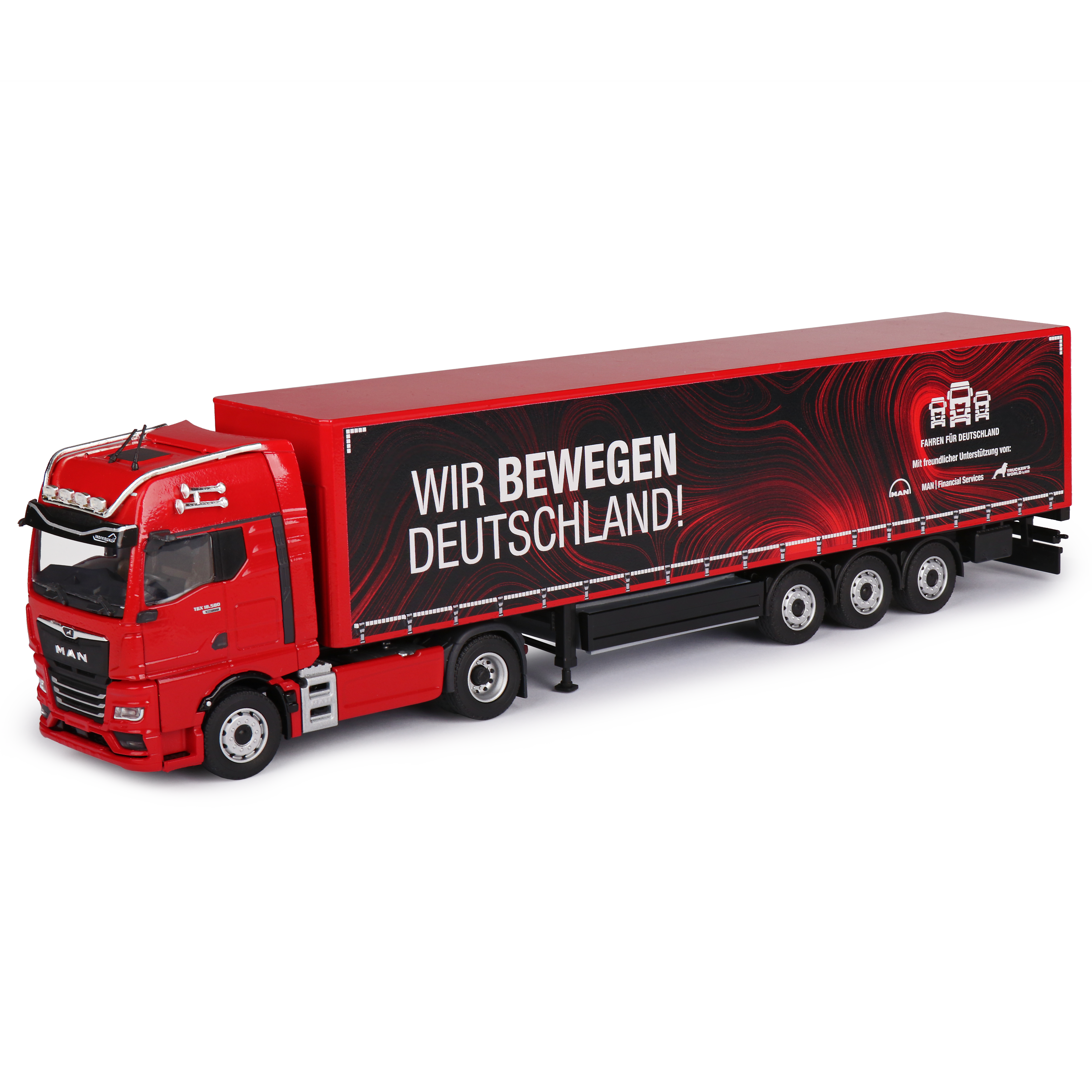 MAN TGX GX 18.580 box semi-trailer Wir bewegen Deutschland